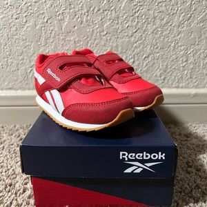 BRAND NEW IN BOX!! Boys toddler Size: 7 Red with white stripe Reebok sneakers.